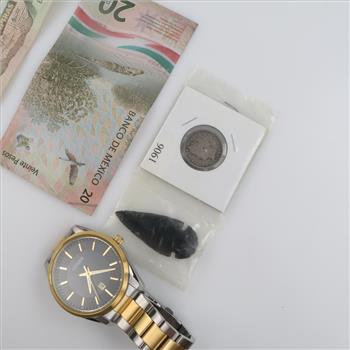 Foreign And U.S. Currency With Citizen Watch