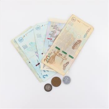 Foreign Currency Includes 1 Silver Coin, 8 Pieces