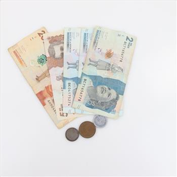 Foreign Currency Includes 1 Silver Coin, 8 Pieces