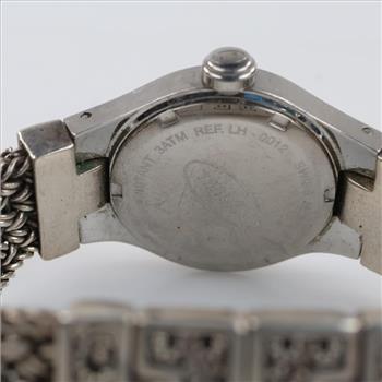 Lois Hill Scroll Face Woven Band Silver Watch