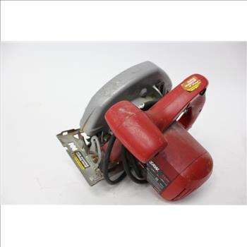 Makita And Skilsaw Circular Saws In A Green Costco Bag