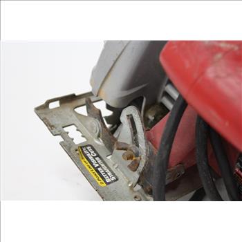 Makita And Skilsaw Circular Saws In A Green Costco Bag