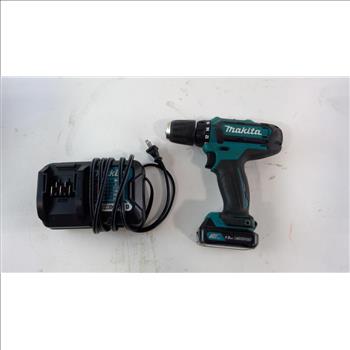 Makita Hammer Drill And Battery Charger
