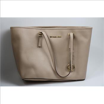 Michael Kors Pink Handbag With Black Michael Kors Wallet, And Coach Wallet