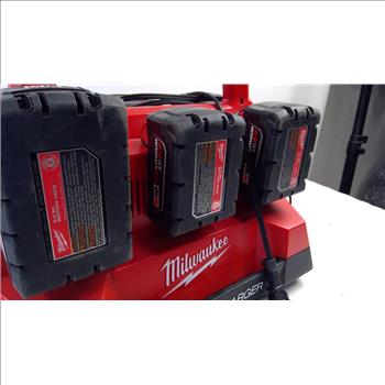 Milwaukee Six Rapid Charger And Batterys