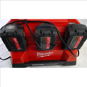 Milwaukee Six Rapid Charger And Batterys