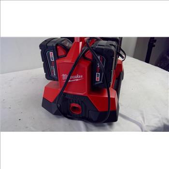 Milwaukee Six Rapid Charger And Batterys
