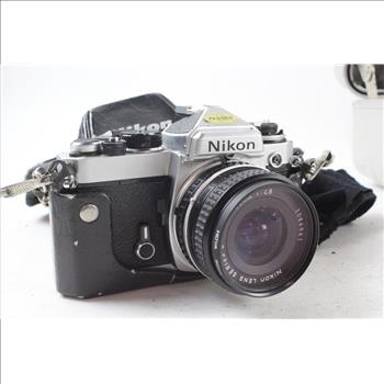 Nikon FE 35mm SLR Camera In a Halliburton Zero Case With Accessories