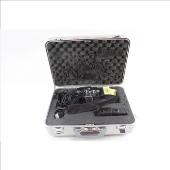 Nikon FE 35mm SLR Camera In a Halliburton Zero Case With Accessories