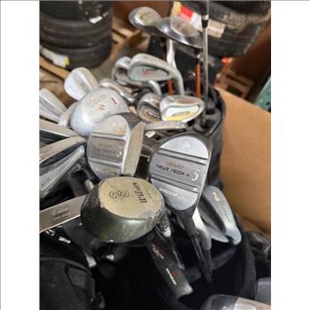 Pallet Of Golf Clubs With Bags