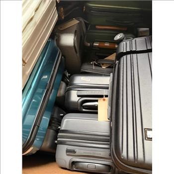 Pallet Of Used Suitcases And Bags