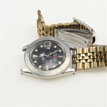 Rolex GMT Stainless Steel -Evaluated By Our Certified Gemologist-AGS/GIA