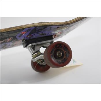 Skateboard With Misc Stickers