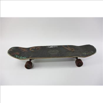 Skateboard With Misc Stickers