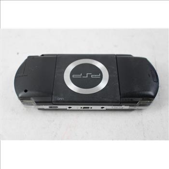 Sony PlayStation Portable, Disc Case With 4 Games