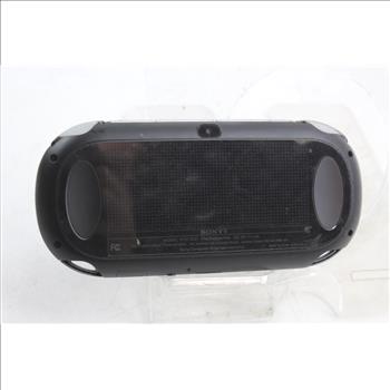 Sony PlayStation Vita Portable Gaming System And Game