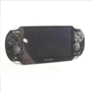 Sony PlayStation Vita Portable Gaming System And Game