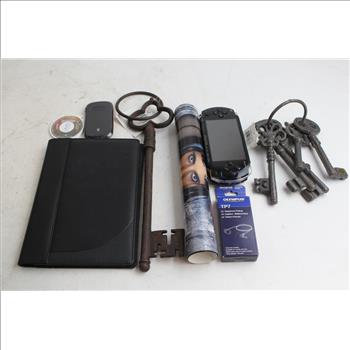 Sony PSP Gaming System, ZTE T-Mobile Hotspot, Olympus TP7 Ear System, & More; 7 Pieces