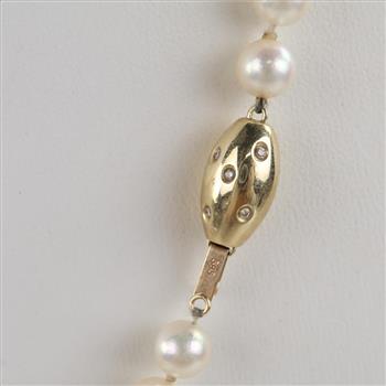 String Of Pearls Necklace With 14kt Gold Diamond Accented Clasp