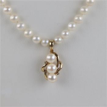 String Of Pearls With 14kt Gold Clasp And Diamond Accented Pendant