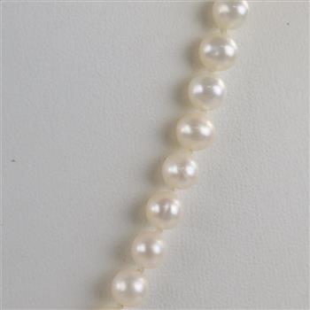 String Of Pearls With 14kt Gold Clasp And Diamond Accented Pendant