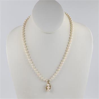 String Of Pearls With 14kt Gold Clasp And Diamond Accented Pendant