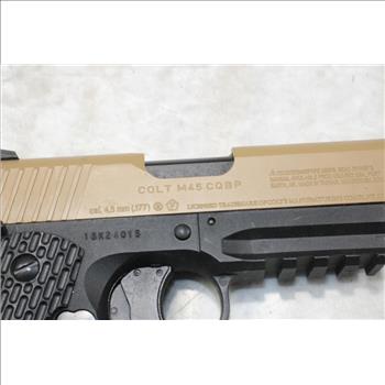Tan & Black Toned COLT 45 Automatic Caliber Gun