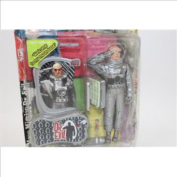 Tasco Zoom, Bushnell Ensign, And Austin Powers Dr. Evil Action Figure