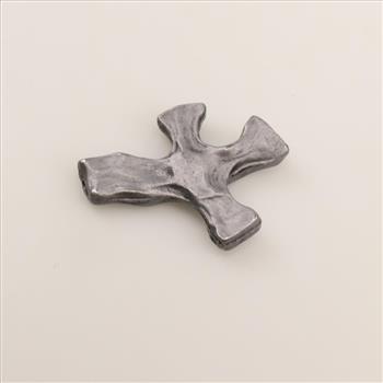 The Tiny Clinging Cross