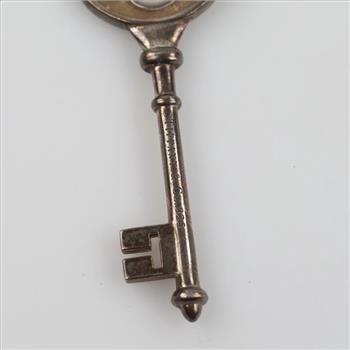 Tiffany & Co. Sterling Silver Diamond Blossom Flower Key Pendant