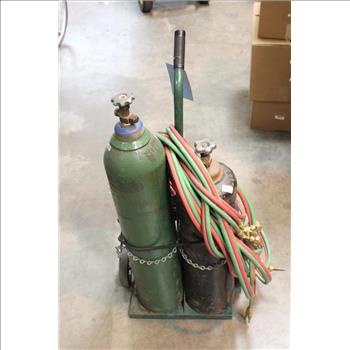 Welding Torch With Hoses And Tanks On Cart