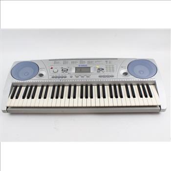 Yamaha Electric Keyboard With Stand