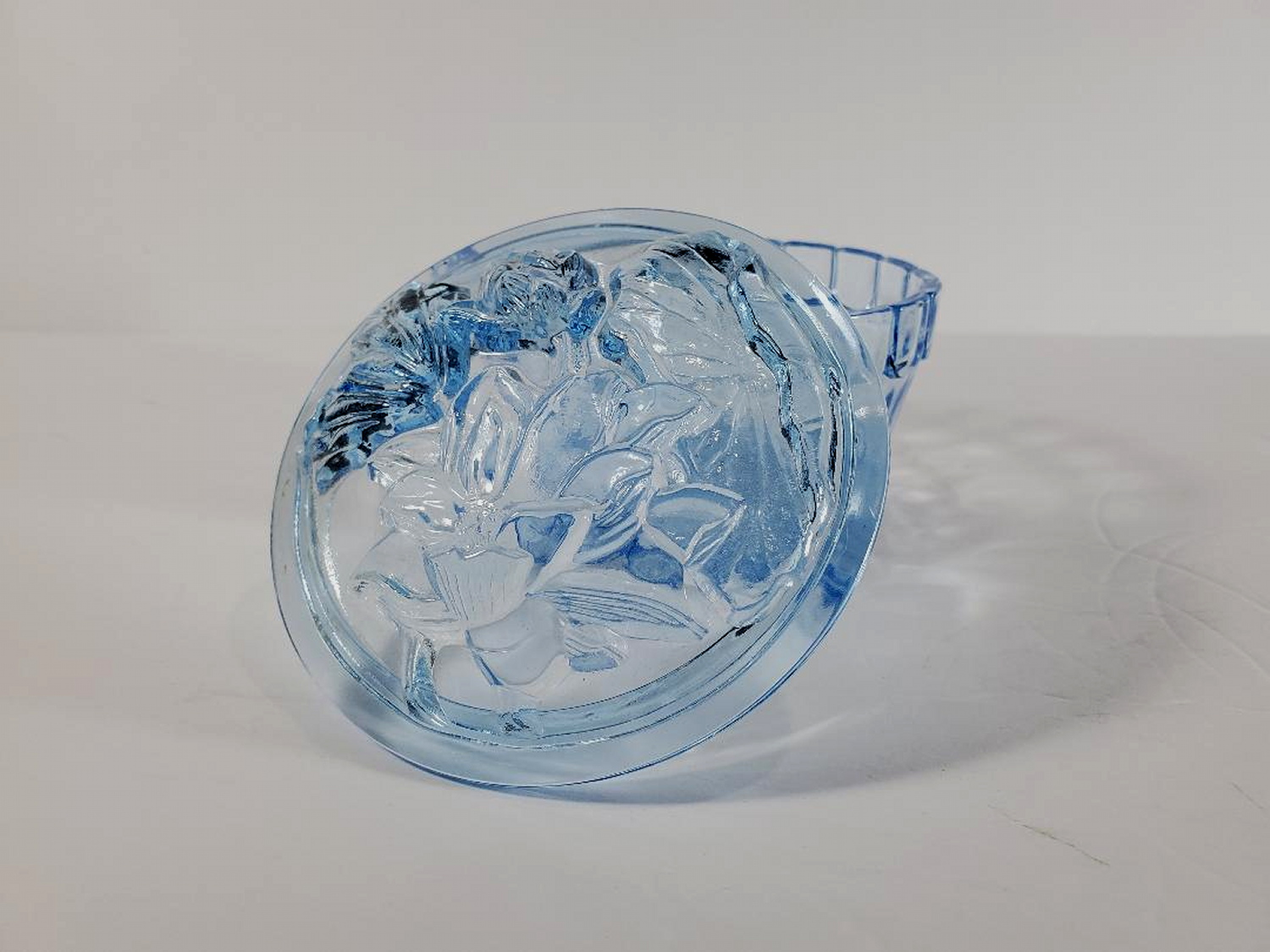 Vintage blue glass candy dish with lid property room