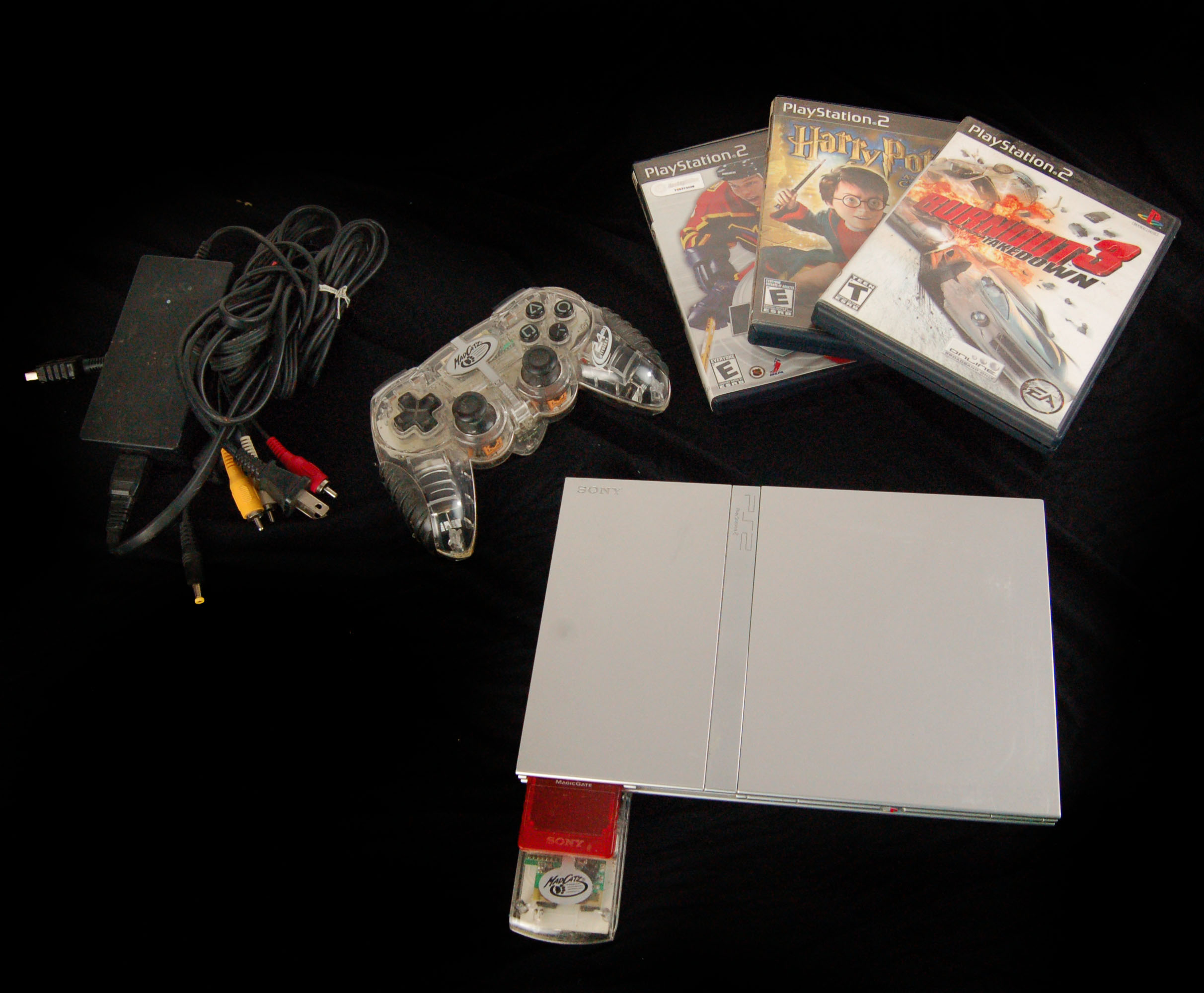 Rare: SONY PLAYSTATION - 2 - SLIM / SILVER WITH CONTROLLER AND GAMES ...