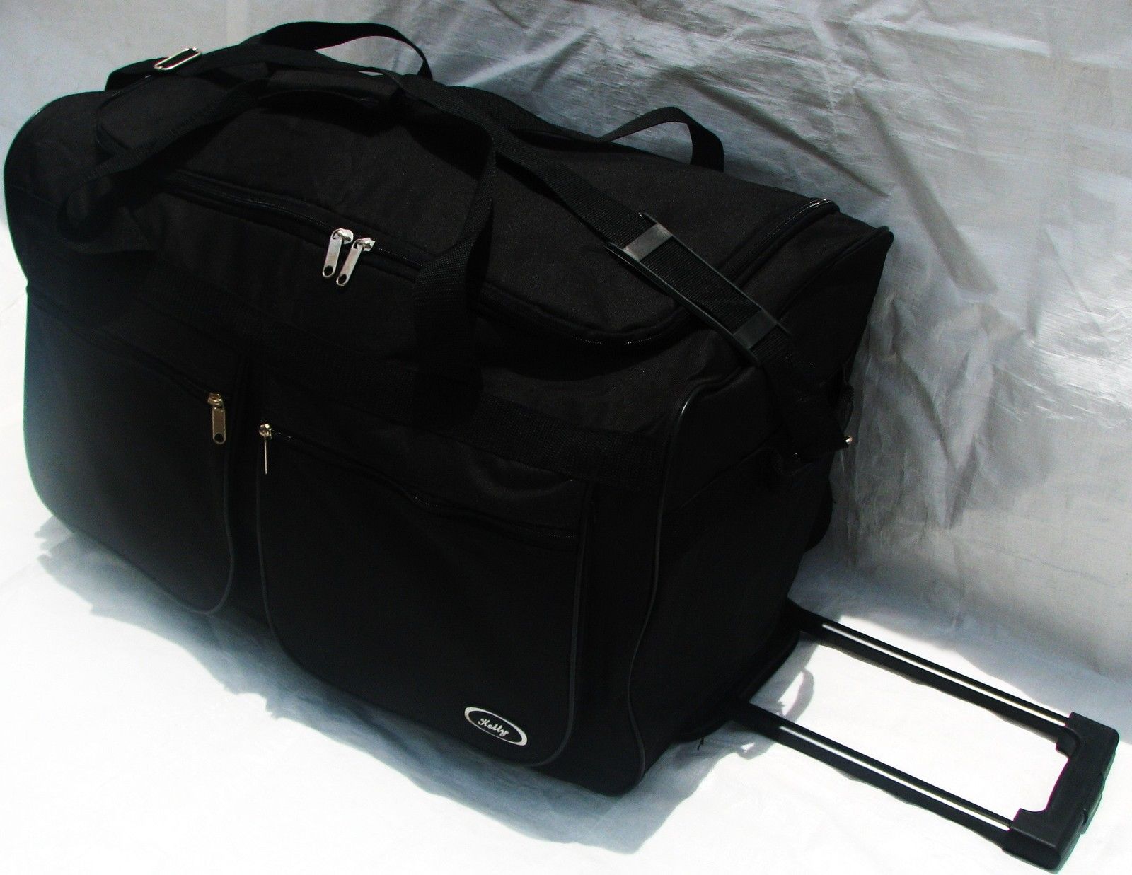 27" 50LB. CAPACITY ROLLING WHEELED DUFFLE BAG / LUGGAGE/SUITCASE