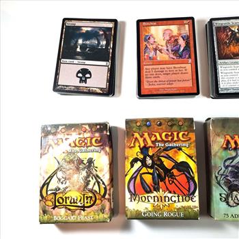 Over 100 Random Magic The Gathering Playing Cards With Four Empty Boxes