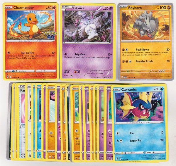 25 Different Pokemon Trading Cards w/ Charmander + More