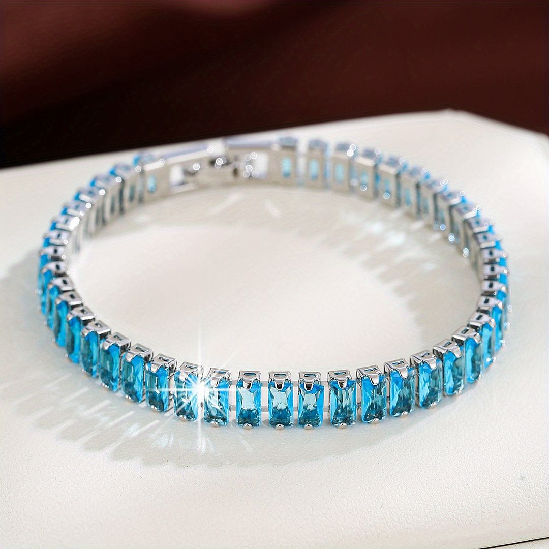 18k Gold Overlay 7.00ctw Blue Topaz Tennis Bracelet