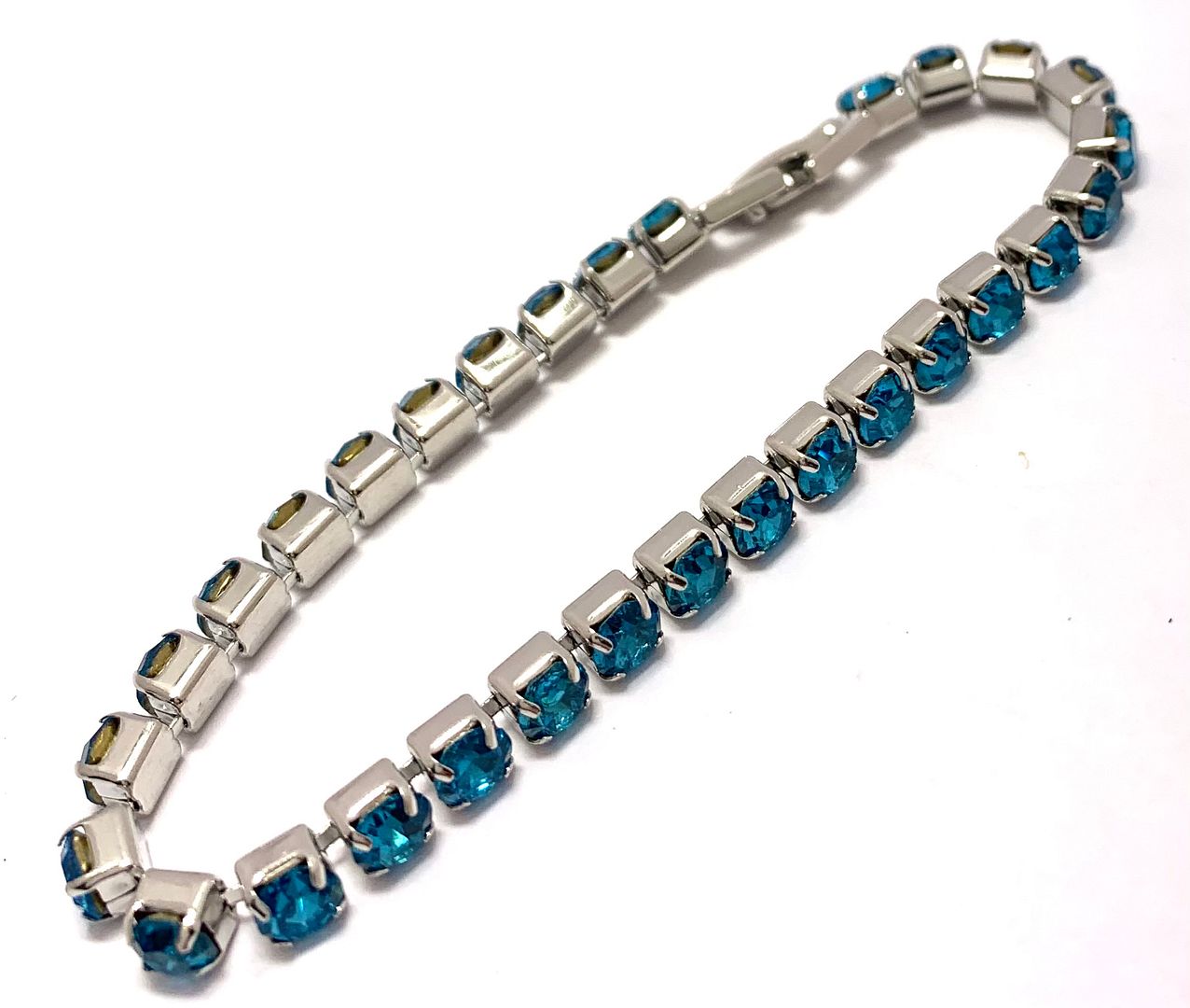 18K Gold Overlay 10.00ctw Blue Topaz Tennis Bracelet