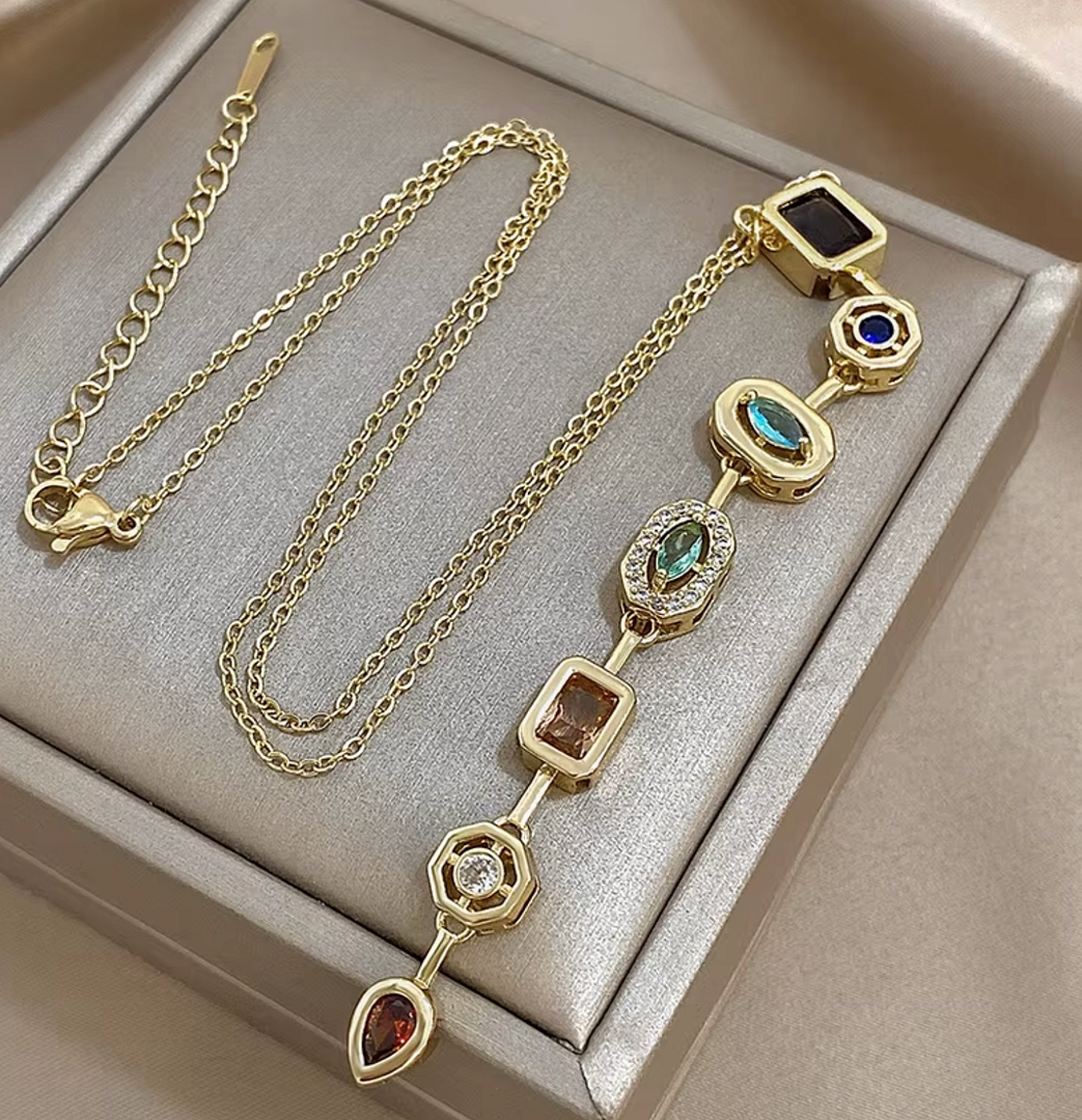 18k Yellow Gold over Titanium Steel Created Multigem Necklce. Adjustable.