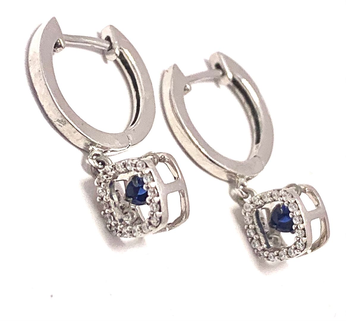 .925 Sterling Silver & 18k White Gold Dancing Diamond Design Earrings.