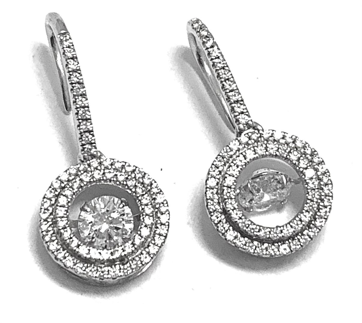 .925 Sterling Silver & 18k White Gold Dancing Diamond Design Earrings.
