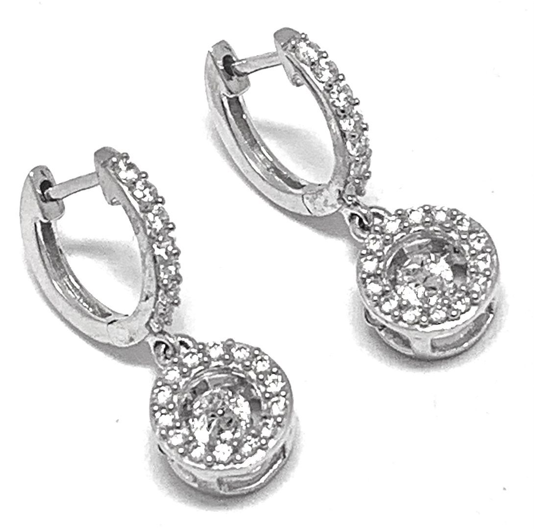 .925 Sterling Silver & 18k White Gold Dancing Diamond Design Earrings.