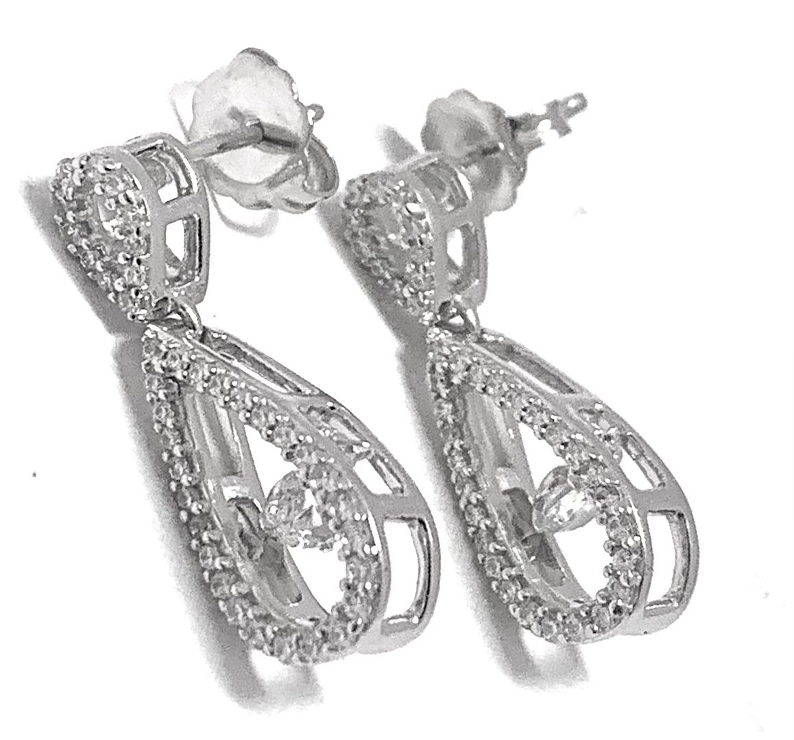 .925 Sterling Silver & 18k White Gold Dancing Diamond Design Earrings.