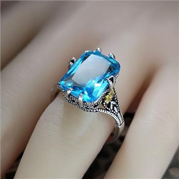 12.00ctw Blue Topaz 18k White Gold Overlay Ring