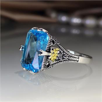 12.00ctw Blue Topaz 18k White Gold Overlay Ring