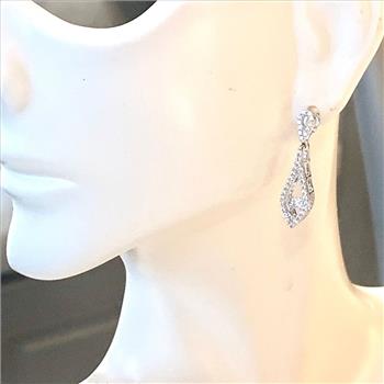 .925 Sterling Silver & 18k White Gold Dancing Diamond Design Earrings.