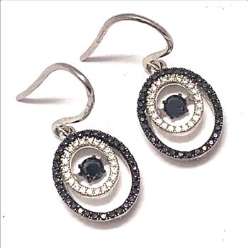 .925 Sterling Silver & 18k White Gold Dancing Diamond Design Earrings.