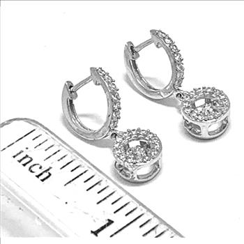 .925 Sterling Silver & 18k White Gold Dancing Diamond Design Earrings.
