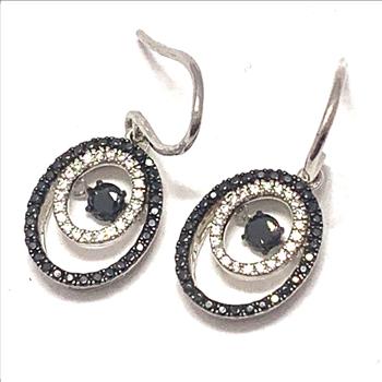 .925 Sterling Silver & 18k White Gold Dancing Diamond Design Earrings.